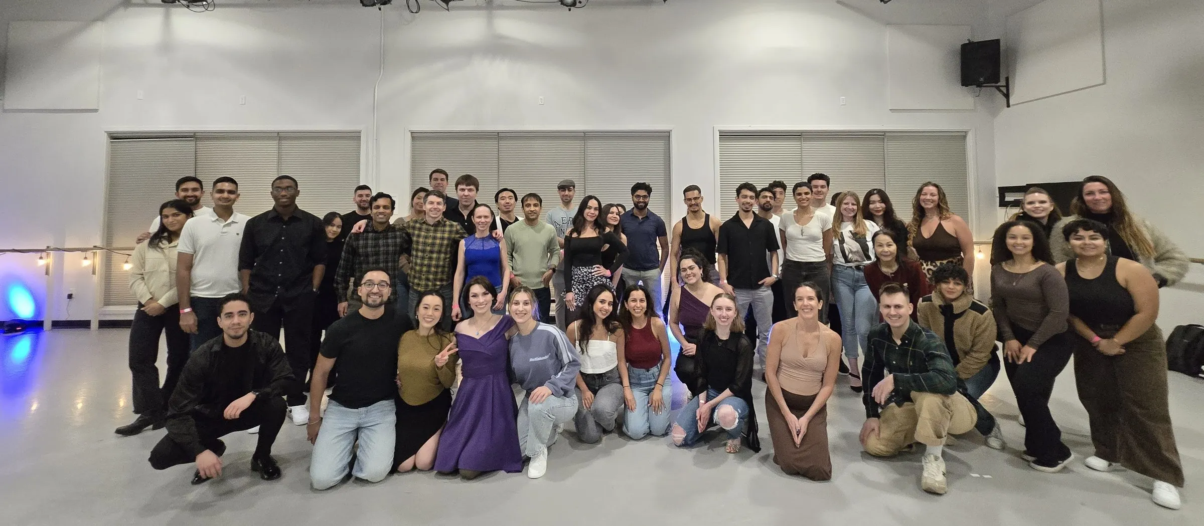 The full Friday class at Bachata Lab gathered together in the studio at the Smuin Center for Dance, San Francisco